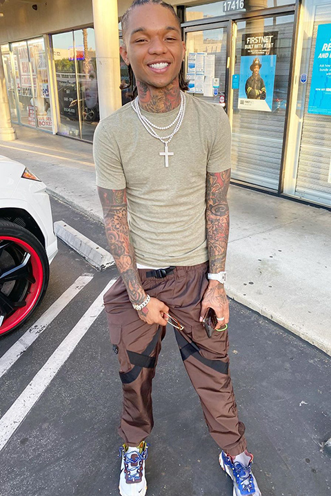 Swae Lee in greenish tshirt and brown pajama